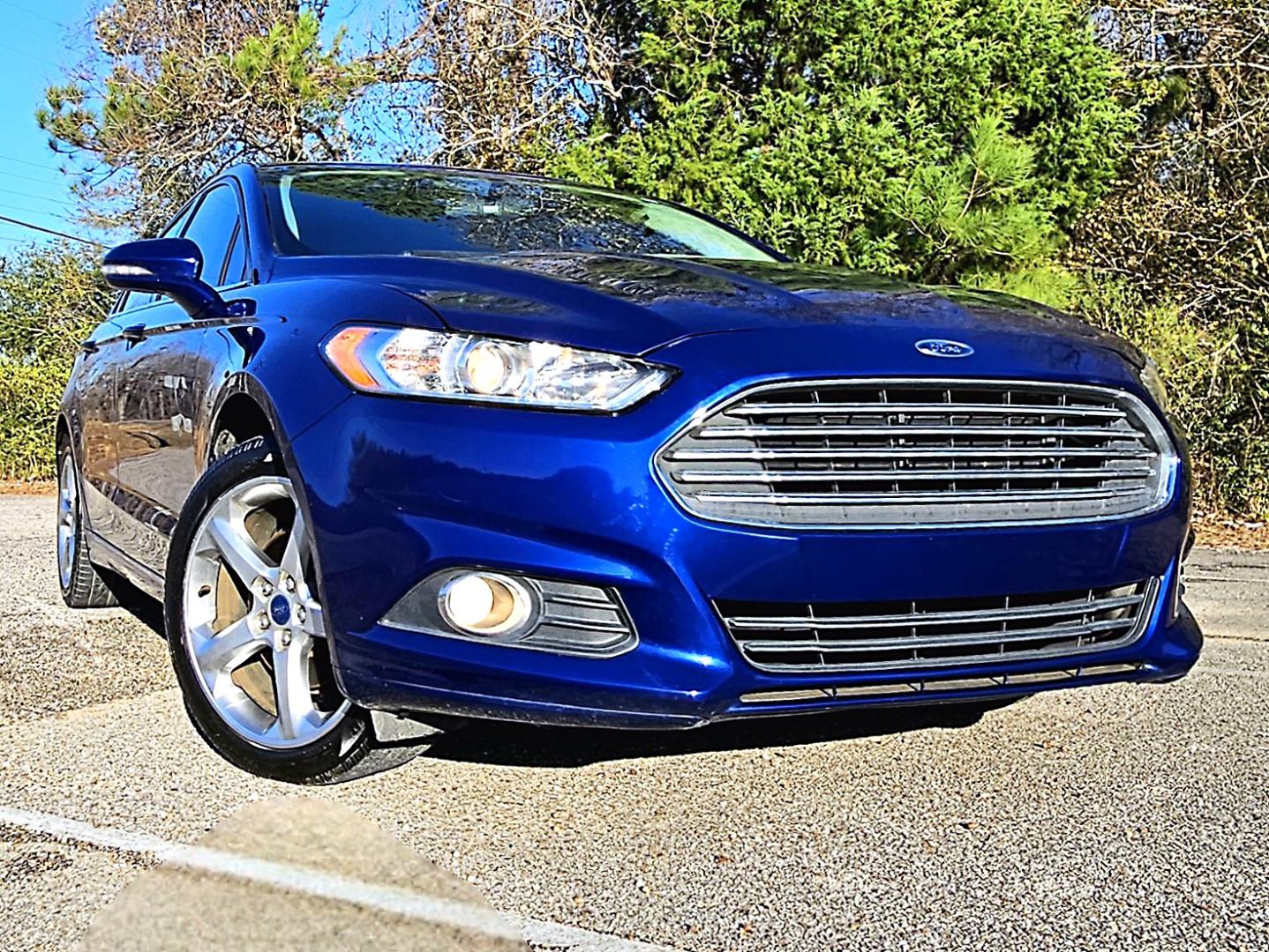 2015 Blue Ford Fusion SE (3FA6P0T96FR) with an 2.0L L4 DOHC 16V engine, Automatic transmission, located at 18001 Kellogg Rd, Saucier, MS, 39574, (228) 832-1441, 39.421459, -76.641457 - Photo#22